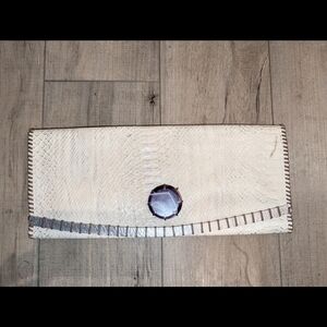 Elegant Vintage Cream Clutch with Purple Accent